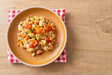 stir-fried tomatoes with egg on plate - healthy food style