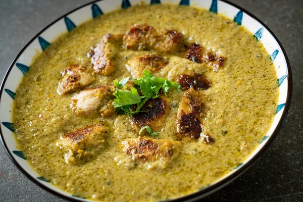 Afghani chicken in green curry or Hariyali tikka chicken hara masala - Indian food style