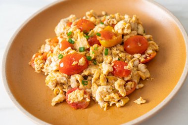 stir-fried tomatoes with egg on plate - healthy food style