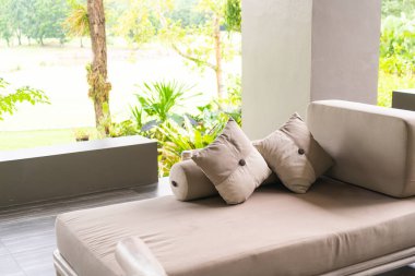 comfortable pillows on sofa in relaxing area
