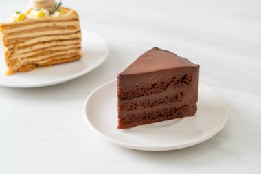 chocolate cake with soft chocolate layer on plate