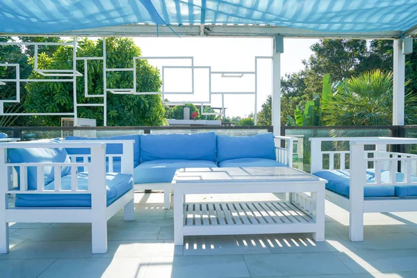 blue and white patio outdoor chair and table