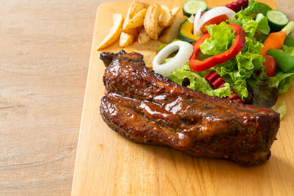 grill barbecue pork spare ribs with vegetables