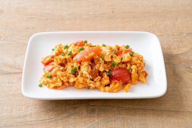 Stir-fried tomatoes with egg or Scrambled eggs with tomatoes - healthy food style