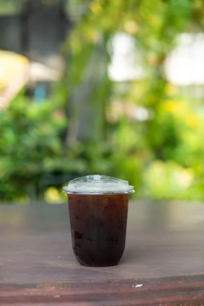 iced black coffee or americano coffee in takeaway glass