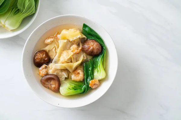 stock image pork dumpling soup with shrimps and vegetable - Asian food style