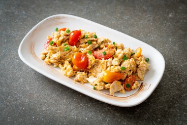 stir-fried tomatoes with egg on plate - healthy food style