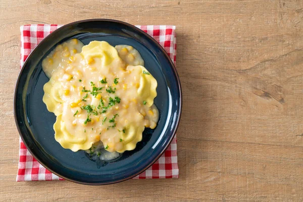 stock image ravioli pasta with corn cheese sauce on plate