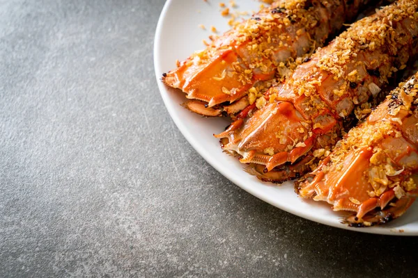 stock image Stir Fried Mantis Shrimp with Garlic on white plate