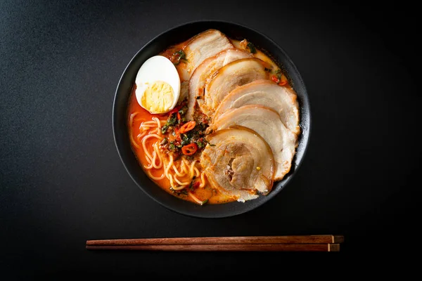 stock image Ramen Noodles Spicy Tomyum Soup with Roast Pork - Fusion food style