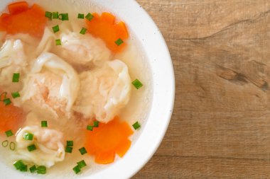 shrimp dumpling soup in white bowl - Asian food style