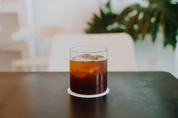 black coffee cold drip on table