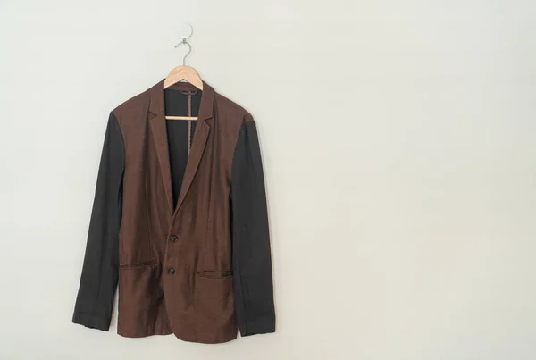 Dark Brown Suit Hanging Wood Hanger Wall — ストック写真