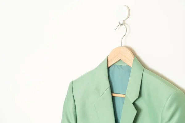 Green Suit Hanging Wood Hanger Wall — Zdjęcie stockowe