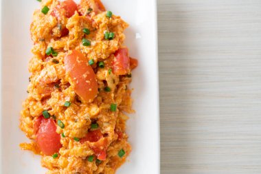 Stir-fried tomatoes with egg or Scrambled eggs with tomatoes - healthy food style