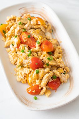 stir-fried tomatoes with egg on plate - healthy food style