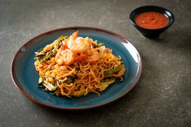 Stir-fried instant noodles sukiyaki with shrimps - Asian food style