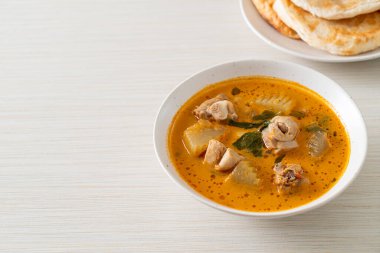 Chicken curry soup with roti or naan with chicken tikka masala - Asian food style