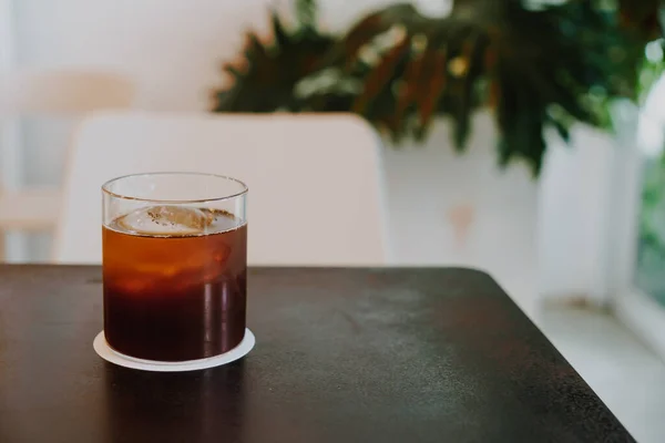 stock image black coffee cold drip on table