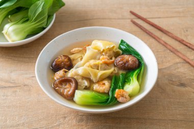 pork dumpling soup with shrimps and vegetable - Asian food style