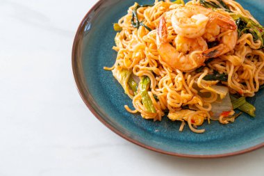 Stir-fried instant noodles sukiyaki with shrimps - Asian food style