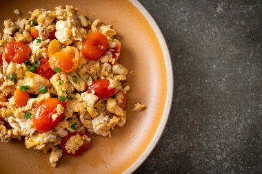 stir-fried tomatoes with egg on plate - healthy food style