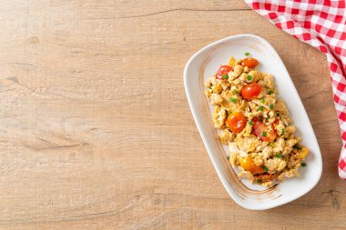 stir-fried tomatoes with egg on plate - healthy food style