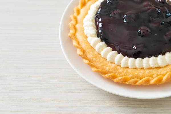 Delicious Blueberry Cheese Pie on white plate