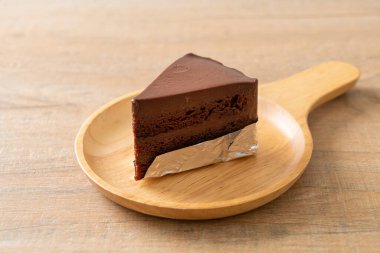 chocolate cake with soft chocolate layer on plate