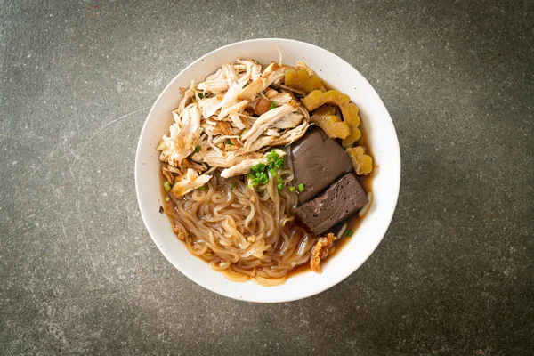 stock image Stewed Chicken Noodle in Brown Soup Bowl - Asian food style