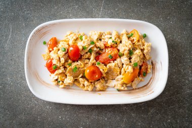 stir-fried tomatoes with egg on plate - healthy food style