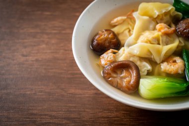 pork dumpling soup with shrimps and vegetable - Asian food style