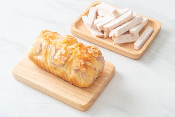 stock image delicious taro toast bread on wood board