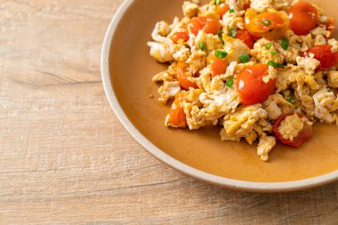 stir-fried tomatoes with egg on plate - healthy food style