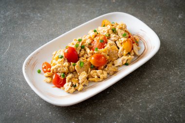 stir-fried tomatoes with egg on plate - healthy food style