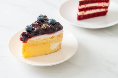 blueberry cheese cake - cheese cake with blueberry jam sauce on top