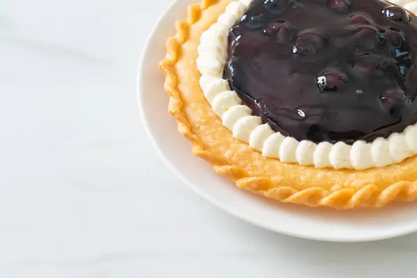 Delicious Blueberry Cheese Pie on white plate