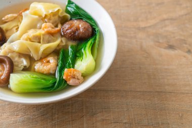 pork dumpling soup with shrimps and vegetable - Asian food style