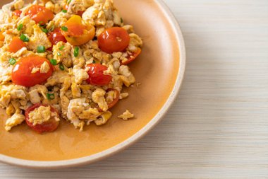 stir-fried tomatoes with egg on plate - healthy food style
