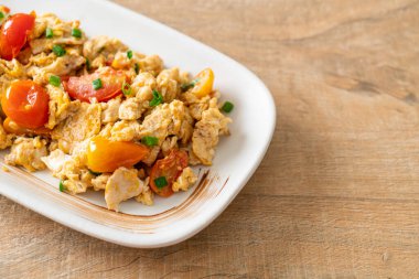 stir-fried tomatoes with egg on plate - healthy food style