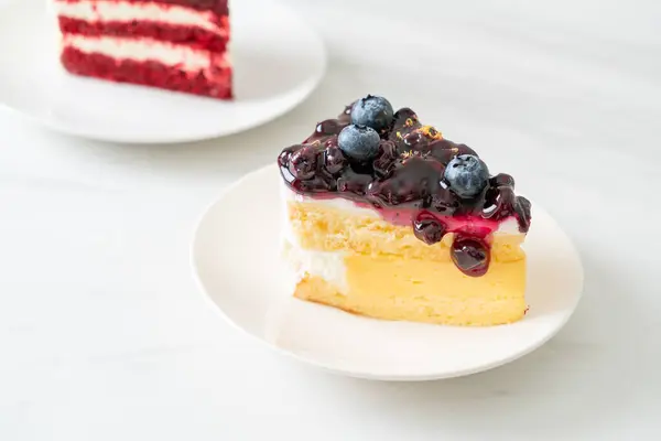 blueberry cheese cake - cheese cake with blueberry jam sauce on top