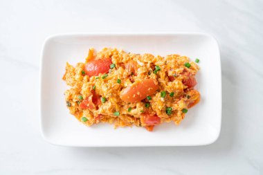 Stir-fried tomatoes with egg or Scrambled eggs with tomatoes - healthy food style