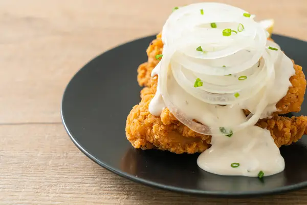 Snow Onion Chicken or Fried Chicken with Creamy Onions Sauce with Lemon in Korean style - Korean food style