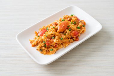 Stir-fried tomatoes with egg or Scrambled eggs with tomatoes - healthy food style