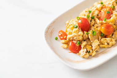 stir-fried tomatoes with egg on plate - healthy food style