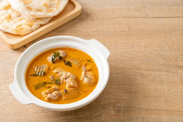 Chicken curry soup with roti or naan with chicken tikka masala - Asian food style