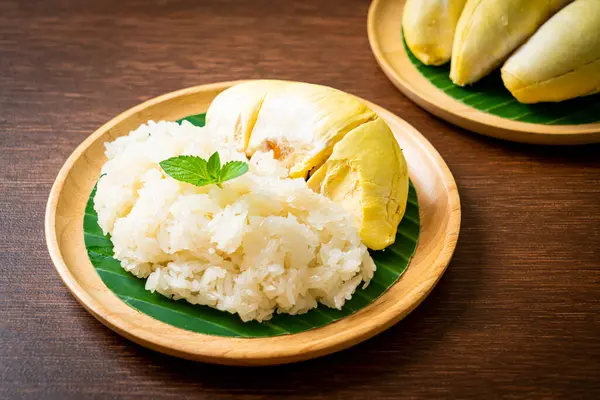 stock image Durian with sticky rice -  sweet durian peel with yellow bean, Ripe durian rice cooked with coconut milk - Asian Thai dessert summer tropical fruit food