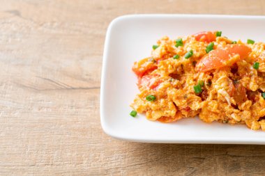 Stir-fried tomatoes with egg or Scrambled eggs with tomatoes - healthy food style