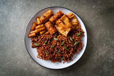 Jajangmyeon or JJajangmyeon with Odeng and Omuk - Korean Instant noodles with Korean fish cake in black bean sauce - Korean food style