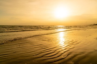 beautiful sea beach with sunset or sunrise time